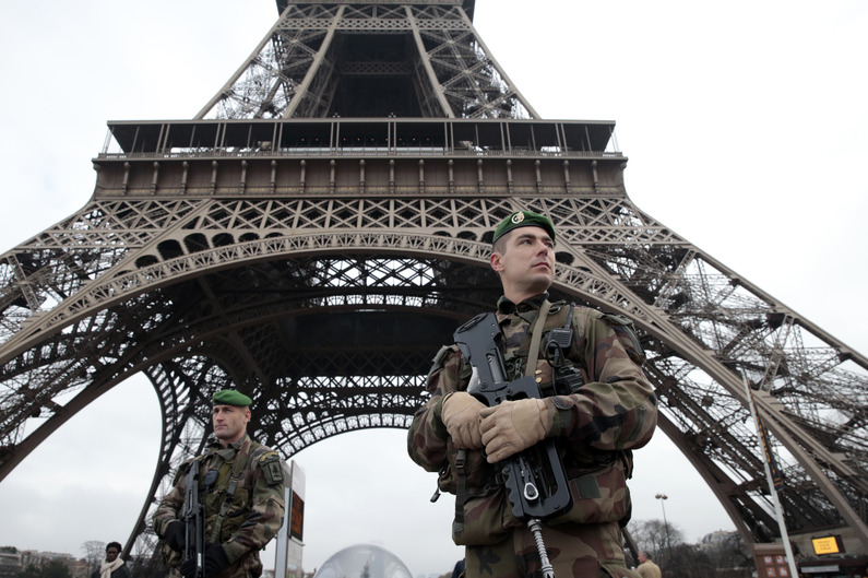 Military in front of the Eiffel tower
